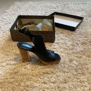 Charles David, still in the box never been worn!